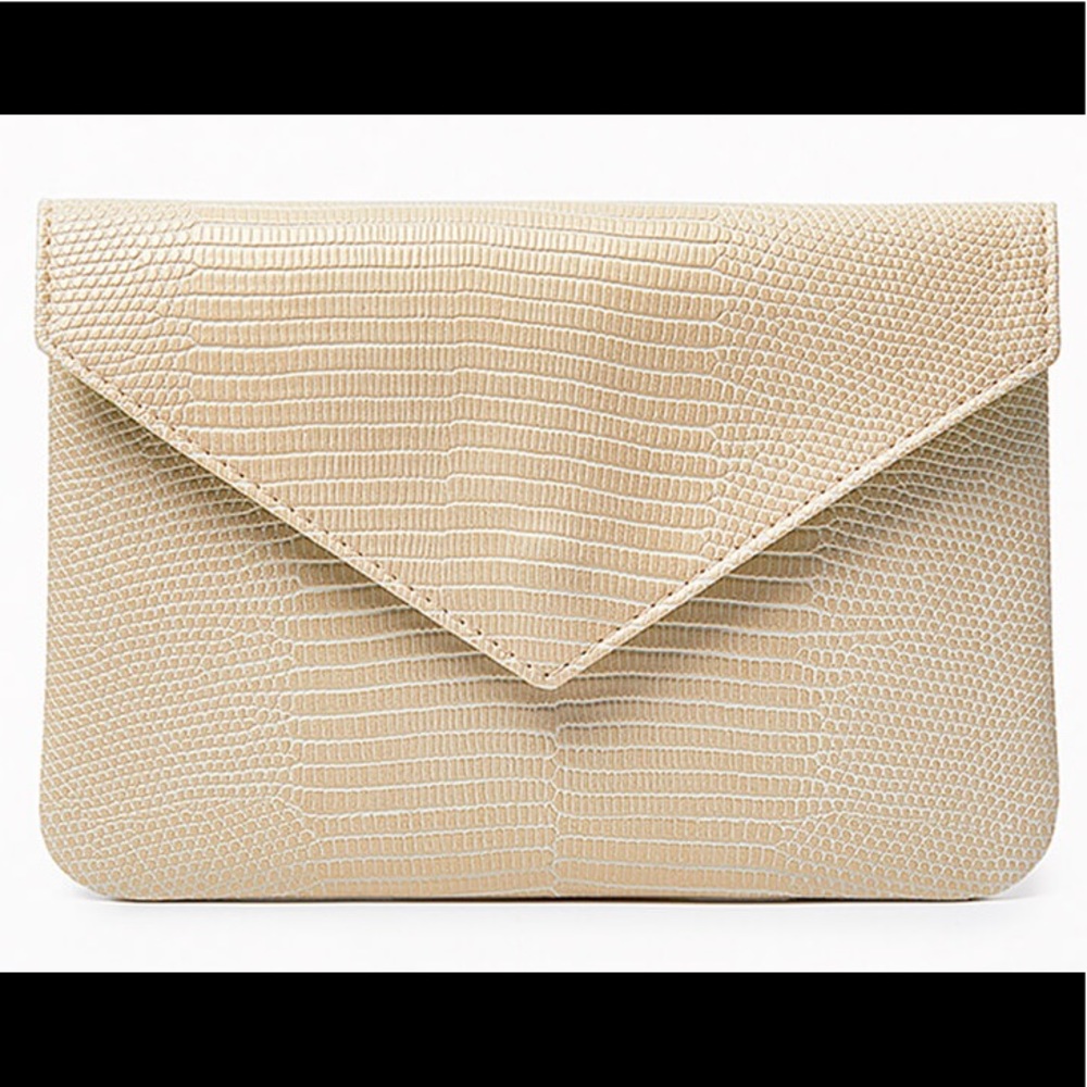 Tan ipsy bag. Green inside